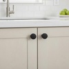image:imageCosmas 25 Pack 5234FB Flat Black Cabinet Knobs  Matte Black Round Cabinet Knob 114 Inch Solid Zinc Metal Kitchen Drawer Dresser Knob Contemporary Hardware Screws Included10